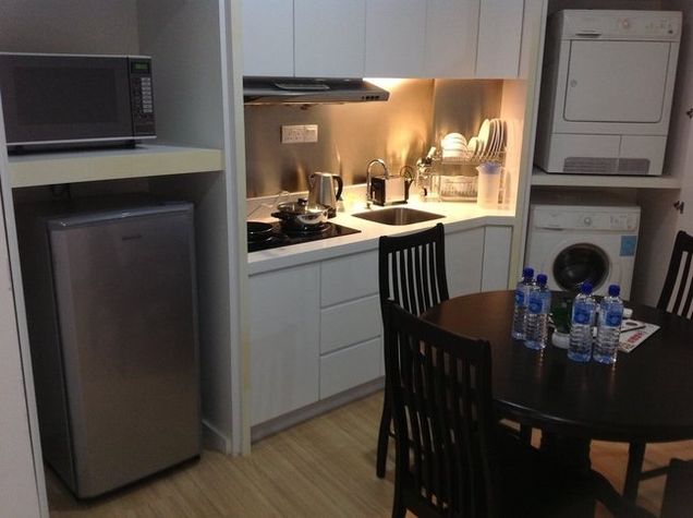 Kitchen with full set utensil kitchenette